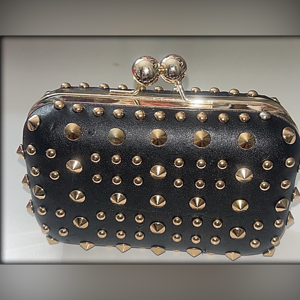 Black purse with gold studs